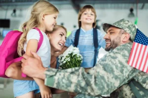 happy family and man in military uniform